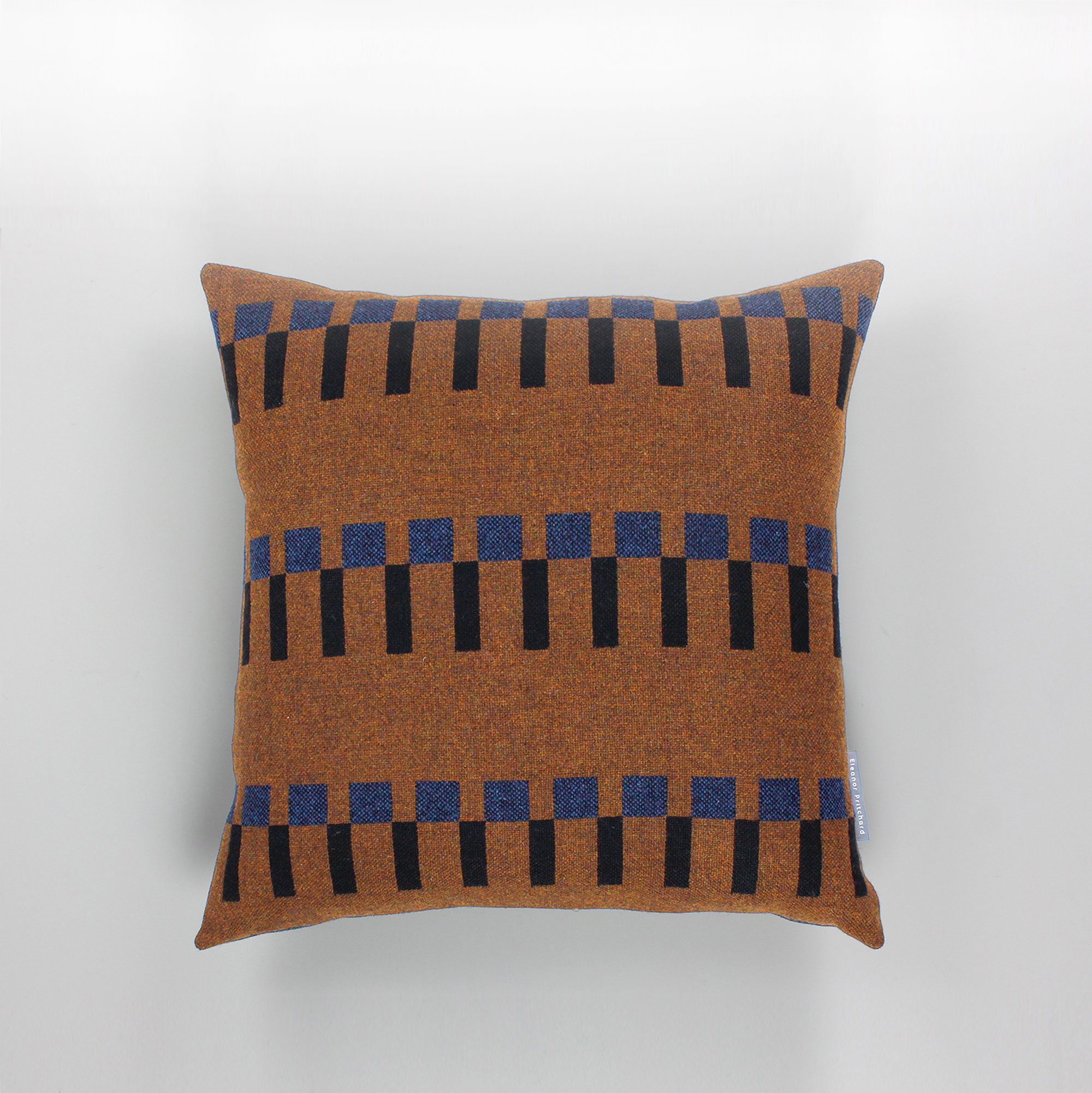 Dovetail Cushion, Tobacco, by Eleanor Pritchard